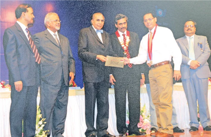 three hot air balloons in a blue sky